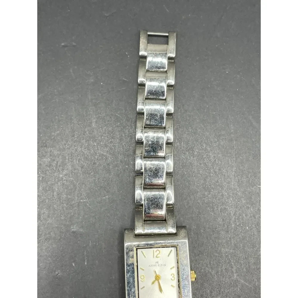Anne Klein Women's 10/1409 Silver Dial Gold Accented Quartz Watch 21.5mm 6.5